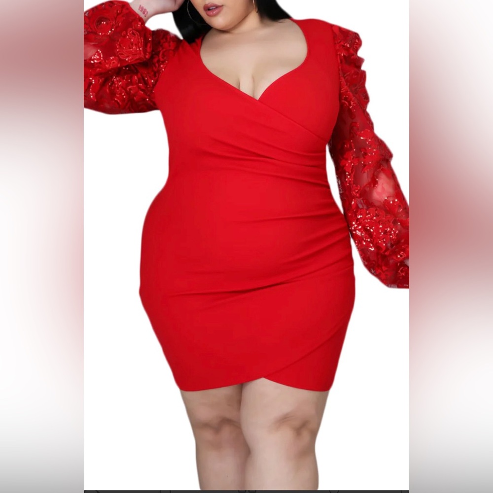 Red form fitting dress with sequins sleeves